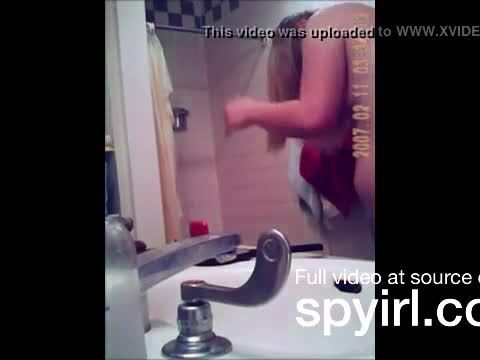 Blonde teen getting in the shower