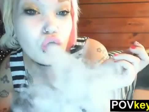 Tattooed Emo Girl Smoking A Cigarette