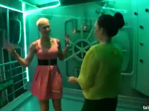 Lesbian clubbers lick pussies in club