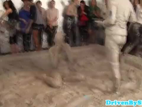 Two european beauties wrestling in mud