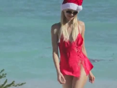 Angel Santa undress by the ocean